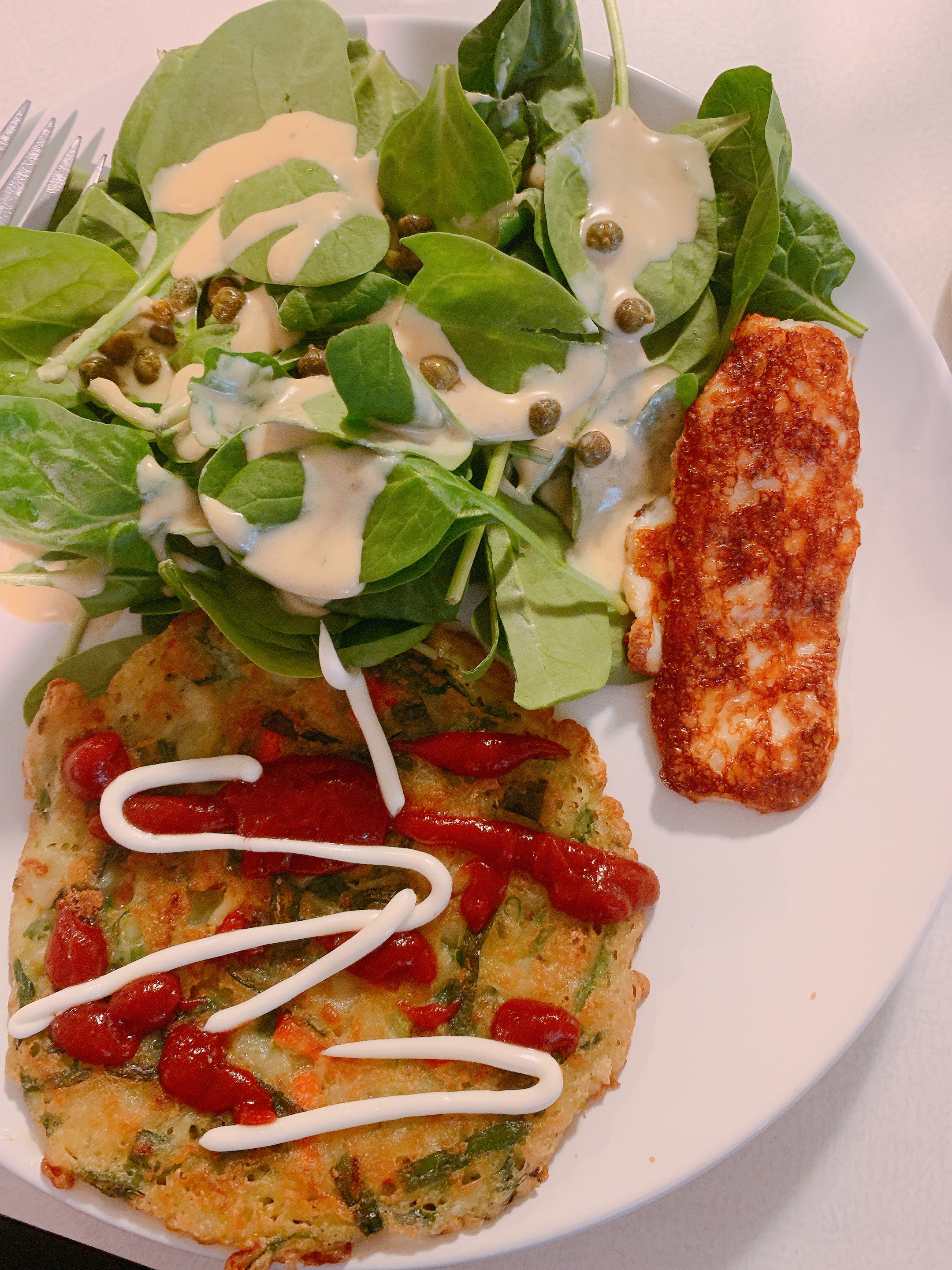 tj's scallion pancakes with grilled halloumi and spinach salad.